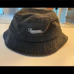 Brand New Supreme Black Wash Denim Bucket Hat. New In Bag. So Gangsta. Trendy Black Bucket Hat For Spring, Vintage Brimmed Streetwear Hats, Vintage Brimmed Hats For Streetwear, Casual Dark Wash Short Brim Hat, Vintage Black Bucket Hat With Curved Brim, Urban Short Brim Hat For Streetwear, Urban Style Short Brim Hat For Streetwear, Casual Black Wide Brim Bucket Hat, Vintage Black Bucket Hat