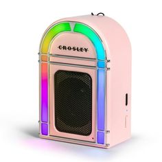 the crosley portable speaker is pink and has rainbow accents on its front side