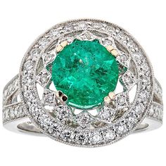 Emerald and Diamond 18 Karat Gold Ring Gia Certified Oval Collectible Ring, Gia Certified Platinum Collectible Rings, Gia Certified Luxury Diamond Ring For Collectors, Heirloom Emerald Ring With Gia Certification, Heirloom Emerald Ring Gia Certified, Luxury Gia Certified Collectible Diamond Ring, Luxury Collectible Gia Certified Diamond Ring, Vintage Emerald Ring With Vvs Diamond, Collectible Round Cut Gia Certified Jewelry