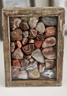 a wooden frame filled with lots of rocks