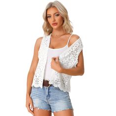 This hollow-out sleeveless cardigan is designed with delicate floral crochet and solid color, offering a sweet and playful look that's perfect for the outdoors. You can match this cardigan with a simple camisole to maximize your wardrobe options. Made with soft fabric, this crochet cardigan is lightweight and breathable, perfect for a day at the beach or poolside lounging. The crochet hollow-out design adds a touch of bohemian charm and allows for a cool breeze to flow through. Spring Vacation V-neck Sweater Vest, Spring Lace Crochet Top With Hollow Out Details, Spring Hollow Out Lace Crochet Top, Lace Vest Top For Spring, Spring Vacation Sweater Vest Sleeveless, Spring V-neck Open Knit Tank Top, Spring Sleeveless Open Knit Vest, White Spring Vest For Vacation, Spring Crochet Sleeveless Top For Day Out