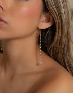 Simplicity! These the fresh water pearl earrings make a fashionable statement. The long and sexy look is striking. Elegant Drop Pearl Earrings With Dangling Beads, Pearl Chandelier Earrings For Party, Chic Linear Drop Earrings For Wedding, Bridal Earrings With Dangling Beads For Party, Pearl Charm Chandelier Earrings For Party, Chic Long Drop Earrings For Party, Chic Pearl Drop Chandelier Earrings For Weddings, Pearl Charm Dangle Chandelier Earrings For Party, Elegant Chandelier Earrings With Dangling Beads For Evening