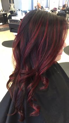 Red Underdye Hair With Highlights, Red Highlights On Black Wavy Hair, Dark Red With Bright Red Highlights, Dark Red Stripes Hair, Red Thick Highlights, Black Hair With Red Highlights Bangs, Dark Hair Red Streaks, Red And Brown Bayalage Hair, Dark Red Hair Color Highlights