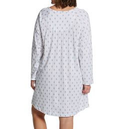 All cotton nightgown with wonderful details and a soft feel. Wide neckline has a round shape with floral applique at front and shoulders. Smocking along bottom of neckline gives bust a fuller fit. Partial button panel at neck has three genuine shell Akoya button closures. Long raglan sleeves. Short hem with vents at sides. Sewn-on fabric information tags on inner back of neck. Loose fit. Pullover styling. Lightweight knit cotton is a great choice for warm weather. Carole Hochman Women's Plus Siz Cotton V-neck Nightgown For Sleepover, Summer Cotton Nightgown With Crew Neck, Cotton Nightgown With Relaxed Fit For Daywear, Cotton V-neck Nightgown For Bedtime, Summer Cotton Crew Neck Nightgown, Relaxed Fit Cotton Nightgown For Casual Wear, Comfortable Long Sleeve Sleep Dresses, Cotton Long Sleeve Nightgown For Sleepovers, Long Sleeve Cotton Nightgown For Sleepover