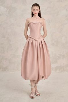 This dress features a unique semi-heart neckline and bubble silhouette, creating an elegant and playful look. Crafted from high-quality taffeta fabric, it comfortably fits while maintaining its shape. Perfect for any occasion, this dress is a must-have addition to your wardrobe. *Product length is measured from the underarm to the hem. Wedding Dress With Folds And Fitted Bodice, Taffeta Evening Dress With Fitted Bodice For Cocktail, Cocktail Evening Dress With Fitted Bodice In Taffeta, Pink Taffeta Cocktail Dress, Cocktail Dress With Sweetheart Neckline In Taffeta, Taffeta Wedding Dress With Sweetheart Neckline, Wedding Dress With Sweetheart Neckline In Taffeta, Wedding Taffeta Dress With Sweetheart Neckline, Pink Taffeta Dress With Pleated Bodice