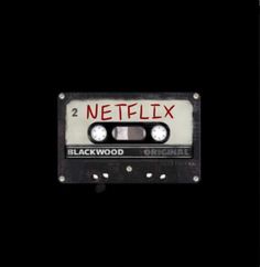 a black and white cassette with the words netflix on it