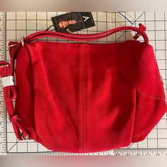 Nwt New With Tags Red Suede Sling Backpack / Handbag/ Purse By Vanessa Williams, Gold Hardware, Includes Black Storage Pouch. About 12” Wide And 10” Tall. Has A Cel Phone Pocket On The Outside, As Pictured. Inside The Purse It Has 2 Cell Phone Size Pockets As Well As A Zipper Pocket. Two Adjustable Straps For Wearing Like A Backpack. Excellent Brand New Condition, Never Used. Genuine Suede. Christmas, Valentine’s Day, Sexy, Red Leather. Casual Red Satchel With Large Capacity, Red Hobo Bag With Zipper For Everyday Use, Red Hobo Bag With Zipper Closure For Everyday, Everyday Red Hobo Bag With Zipper Closure, Softback Shoulder Bag With Adjustable Strap For Shopping, Shopping Shoulder Bag With Adjustable Strap, Adjustable Strap Softback Shoulder Bag For Shopping, Chic Red School Bag, Red Shoulder Bag With Zipper For Everyday