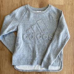 Brand New Sweatshirt / Without Tags. Kids Youth Adidas Sweater. Youth Size 14 (Large) Gray Sporty Tops For Playwear, Sporty Long Sleeve Playwear Top, Sporty Long Sleeve Tops For Playwear, Casual Playwear Tops With Ribbed Cuffs, Winter Crew Neck Sweatshirt For Playwear, Winter Playwear Sweatshirt Crew Neck, Winter Playwear Crew Neck Sweatshirt, Casual Long Sleeve Sweater For Playwear, Sporty Long Sleeve Sweatshirt For Playwear