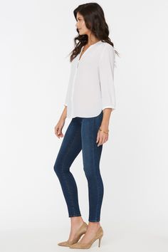 NYDJ's Pintuck Pleat Back Women's Blouse boasts a billowy long sleeve silhouette that's perfect when paired with any of our slimming Women's denim styles. Pleating at the back yoke creates a sophisticated yet easy drape. Split round neckline with covered full front placket and button closure. | NYDJ Women's Pintuck Blouse in Optic White, Regular, Size: Medium | Denim Fitted Long Sleeve Blouse For Casual Gatherings, Spring Long Sleeve Fitted Tops, Versatile 3/4 Sleeve Blouse For Fall, Classic 3/4 Sleeve Blouse For Fall, Classic 3/4 Sleeve Fall Blouse, Classic Fall Blouse With 3/4 Sleeves, Classic Blouse With 3/4 Sleeves For Fall, Pintuck Blouse, Sleeve Silhouette