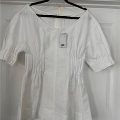 Size 8. Nwt. Cos Blouse. Fitted Cotton Top For Daytime, Daytime Relaxed Fit Short Sleeve Tops, Elegant Short Sleeve Blouse For Daytime, Classic Spring Tops For Day Out, Classic Tops For Day Out In Spring, White Fitted Blouse For Spring, Classic Tops For Spring Day Out, Spring Fitted Tops New With Tags, Fitted Spring Tops New With Tags