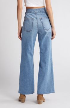 Add a retro vibe in wide-legged jeans finished with unfinished hems and cut from stretch-kissed Japanese denim. 30" inseam; 22" leg opening; 12 1/2" front rise; 15" back rise (size 29) Zip fly with button closure Front welt pockets 98% cotton, 2% polyurethane Machine wash, line dry Made in the USA of imported fabric Summer Wide-leg Flares With Frayed Hem, Fitted Wide Leg Flares With Frayed Hem, Chic Denim Flares For Spring, High Rise Denim Flares For Summer, Summer High Rise Denim Flares, Dark Wash Full Length Flares For Spring, Spring Dark Wash Full-length Flares, Spring Dark Wash Full Length Flares, Fall Medium Wash Wide-leg Flare Jeans