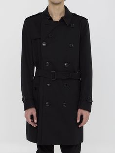 Heritage Kensington medium trench coat in black water-repellent cotton gabardine. It features epaulettes, hook closure on collar, double-breasted button closure, detachable belt at waist, two side buttoned welt pockets, belted cuffs, buttoned back vent and Burberry Check lining. Regular fit.  Size nationality: IT  Product number: 134001  Product code: 8079386A1189  Composition: 100% cotton Platform Wedge Heels, Trench Coat Black, Black Water, Dress With Cardigan, Premium Brands, Clothes Collection, Cardigan Jacket, Welt Pockets, Repellent