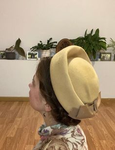 "This is truly a perfectly delightful 1960s Hat! The Felt structure and elegant bow make this a perfect all season piece! Now, with winter just around the bend, its the right time to find the hat that suits your style best! This piece has the classic 'high crown' look of the decade and sits comfortably on your head! I truly love it myself but, since I'm into earlier decades, I thought it might find a forever home with someone special! Overall this hat is in wonderful condition! A small darkened 1960s Hats, Around The Bend, Cloche Hats, Crown Heights, Cloche Hat, Forever Home, Right Time, Felt Hat, How To Make Bows