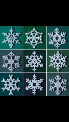 several snowflakes made out of white plastic on green and black background with text that reads