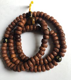 These used Tibetan prayer beads are good quality Bodhi seeds and made by Tibetan who live in Nepal. One has very good jade and Agate Guru bead. Another one has Black Jade with compassion mantra beads and Tiger eye guru bead. (1) Tiger eye guru bead. 18 inches long (2) Agate guru bead. 19 inches long Brown Spiritual Beads For Meditation, Spiritual Brown Beaded Bracelets For Rituals, Spiritual Brown Beaded Bracelets, Traditional Wooden Beaded Bracelets For Meditation, Spiritual Healing Brown Beads, Traditional Beaded Bracelets For Meditation With 108 Beads, Spiritual Polished Beads For Meditation, Traditional Brown Mala For Meditation, Spiritual Brown Mala For Healing