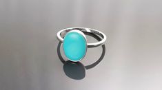 Simple and Chic in Design, this Sterling Silver Round Ring is set with a Beautiful Turquoise Stone. All our stones are hand selected for best quality assurance, then precisely sawed, and shaped into the desired geometry. The stones are then delicately grinned, sanded and hand polished to make sure the jewelry have the perfect aesthetic. ► DIMENSIONS : * Ring size : 10mm X 7mm * Silver weight: 1.3 gr. ► PRODUCTION METHOD:  💓 Handmade with Love and Care 💓 ► MATERIALS: * High Quality High Quality Modern Turquoise Ring As Gift, Modern Turquoise Ring For A Gift, Modern Turquoise Ring For Gift, Minimalist Turquoise Jewelry For Anniversary, Turquoise Minimalist Jewelry For Anniversary, Turquoise Aquamarine Birthstone Ring, Blue Minimalist Aquamarine Jewelry, Handmade Turquoise Aquamarine Ring, Modern Blue Turquoise Gemstone Ring