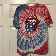 The Rolling Stones Boys Tie & Dye T-Shirt Blue Short Sleeve T-shirt With American Flag Print, Multicolor Short Sleeve Shirt For 4th Of July, Casual Multicolor T-shirt For 4th Of July, Multicolor Cotton T-shirt For 4th Of July, Multicolor Cotton Top For 4th Of July, Patriotic Blue T-shirt For Summer, Multicolor Flag Print Casual T-shirt, Blue Cotton Patriotic Shirt, 4th Of July Multicolor Cotton Shirt