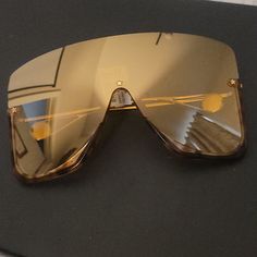 Brand New With Box Designer Gucci Shield Sunglasses With Mirrored Lenses, Elegant Gold Shield Sunglasses With Uv Protection, Luxury Rectangular Shield Sunglasses With Mirrored Lenses, Gold Rimless Shield Sunglasses With Polarized Lenses, Designer Gold Shield Sunglasses With Gradient Lenses, Modern Gold Shield Sunglasses With Glass Lenses, Modern Gold Shield Sunglasses With Glass, Gucci Gold Sunglasses With Gradient Lenses, Chic Gold Gucci Sunglasses