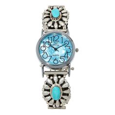 Chaco Canyon Campitos Turquoise Floral Bracelet Watch  Turquoise-studded, sterling silver squash blossoms form this watch's floral bracelet and make the piece a special find for anyone passionate for Navajo design or distinctive timepieces.       Bracelet approx. 9-3/4"L x 1-3/8"W; fits 7-3/4" to 9-3/4" wrist     Case approx. 1-7/16"L x 1-3/8"W x 5/16"H     Stamped .925 sterling silver, stainless steel     Arabic number hour markers     Hour, minute, second hands      Quartz movement     Glass crystal      Four floral-design sterling silver stations form bracelet; Campitos turquoise gem bezel-set in each station; silvertone O-rings with toggle clasp      Blue simulated mother-of-pearl dial      Designed and Crafted in the USA    Stone Information       All sizes and weights approximate Chaco Canyon, Squash Blossoms, Turquoise Gem, Southwest Jewelry, Floral Bracelet, Color Bands, Jewelry Show, Wedding Watch, Quartz Movement