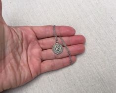 "This is a understated and elegant little boho disc pendant necklace. It is perfect for everyday wear and would go with just about anything. The disc measures 3/4\" long by 5/8\" wide and is made from allergy free plated silver. It hangs from a simple stainless steel necklace chain. I have matching earrings in my shop, if you would like the whole set. Here is the link https://etsy.me/2VZ551y Thanks for stopping by! Please take a moment and visit the rest of my Etsy shop. I have many more unique Bohemian Round Necklace For Everyday Wear, Bohemian Round Necklace For Everyday, Everyday Bohemian Round Necklace, Bohemian Everyday Round Necklace, Everyday Bohemian Charm Necklace With Round Pendant, Silver Necklace With Delicate Chain For Festivals, Bohemian Silver Charm Necklace With Delicate Chain, Bohemian Necklace With Delicate Chain And Round Pendant, Bohemian Charm Necklaces With Delicate Chain