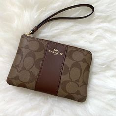 Adorable Coach Wristlet With Classic Print. Has Space For Cards Inside, Keep Things Organized And Perfect For On The Go, As A Wallet, Or Make It Into Diy Crossbody Mini Bag. 6.25”X4” Check Out My Closet And Bundle Up Brown Clutch Pouch With Wrist Strap, Brown Pouch Wristlet For On-the-go, Coach Handheld Wristlet For Everyday Use, Coach Handheld Wristlet For Daily Use, Brown Wristlet With Removable Pouch As Gift, Brown Pouch With Wrist Strap For Daily Use, Trendy Brown Rectangular Wristlet, Brown Rectangular Wristlet For On-the-go, Brown Rectangular Bags With Wrist Strap