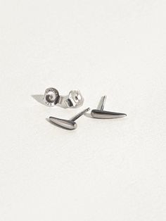 Elevate your ear game with these exquisite Dainty Tusk Stud Earrings. Perfect for those who appreciate subtlety, these delicately designed studs are a delightful way to stay ahead of the latest jewelry trends while making a graceful statement. These tusk earrings are an effortless addition to any outfit, offering a touch of elegance and sophistication. They are crafted for those who seek beauty in the smallest details, embodying both style and subtlety. Discover the charm of tusk earrings and le Minimalist Sterling Silver Tarnish-resistant Ear Climbers, Minimalist Sterling Silver Tarnish Resistant Ear Climbers, Elegant Sterling Silver Tarnish-resistant Ear Climbers, Classic Sterling Silver Ear Climbers For Gift, Classic Sterling Silver Ear Climbers As Gift, Elegant Tiny Sterling Silver Ear Climbers, Elegant Sterling Silver Ear Climbers For Everyday, Tiny Silver Classic Earrings, Tiny Classic Silver Earrings