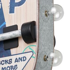 a close up of a skateboard with two lights on it's back end