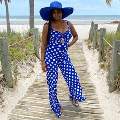 Stretch Jumpsuit, Sleeveless, Back Zipper Closure, Wide Leg, Polka Dot Print. Model Is Wearing A Small. Polka Dot Sleeveless Summer Swimwear, Sleeveless Polka Dot Summer Swimwear, Spring Sleeveless Swimwear With Polka Dot Pattern, Polka Dot Sleeveless Swimwear For Spring, Sleeveless Polka Dot Jumpsuits And Rompers, Purple Sleeveless Jumpsuit For Vacation, Casual Sleeveless Swimwear With Polka Dot Pattern, Casual Sleeveless Polka Dot Swimwear, Chic Sleeveless Jumpsuit For Poolside