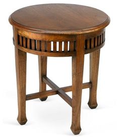 a small wooden table with an oval top