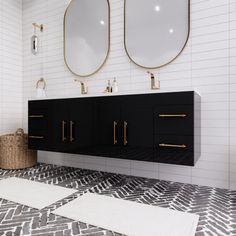 a bathroom with two sinks and mirrors on the wall next to a rug in front of it