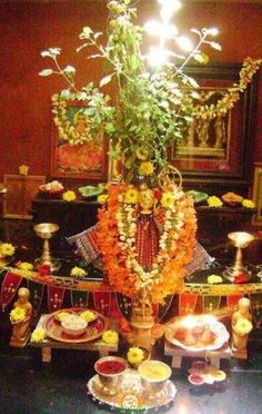 a table topped with lots of food and flowers