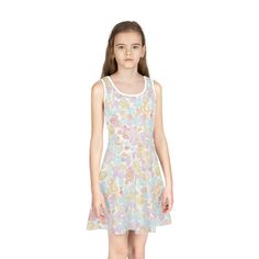 Crafted from high-quality materials, this dress is perfect for any occasion, from a casual day out to a special event. The playful candy pattern in soft pastel colors will make your little girl stand out and show off your unique sense of style. She will absolutely love it! The dress is designed with comfort in mind, featuring a soft and breathable fabric that will keep you cool and comfortable all day long. The lightweight design is perfect for warm weather, and the adjustable straps ensure a perfect fit. .: Material: 95% polyester, 5% spandex .: Medium fabric (6.5 oz/yd² (220 g/m .: Mid-length .: A-line cut .: Seam thread color automatically matched to design (black or white) Playful Multicolor Sleeveless Summer Dress, Playful Multicolor Sleeveless Dress For Spring, Playful Spring Printed Dress, Playful Printed Spring Dress, Playful White Floral Print Sundress, Playful Sleeveless Dress For Spring Party, Playful Printed White Dress, Playful White Printed Dress, Playful Floral Print Sleeveless Summer Dress