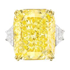 Radiate unparalleled elegance with this GIA Certified 10.05 Carat Fancy Yellow Radiant Cut Diamond Ring, adorned with trapezoid diamonds on the side. At the heart of this magnificent ring gleams a captivating cushion-cut diamond, certified by the esteemed Gemological Institute of America (GIA) for its exceptional quality. Despite being classified as Fancy Yellow, this diamond exudes a brilliance and warmth that is truly enchanting. With a Clarity Grade of VS2, the diamond showcases impeccable clarity, allowing light to dance through its facets with mesmerizing allure. Crafted with meticulous precision, the diamond displays Excellent Polish and Excellent Symmetry, ensuring each facet reflects light with stunning brilliance and precision. Enhanced by its none fluorescence, the diamond's natu Rings Fancy, Glitter Rocks, Fancy Yellow Diamond Ring, Radiant Cut Diamond Ring, White Engagement Ring, Jewelry Fancy, Yellow Diamond Ring, Canary Diamond, Yellow Ring