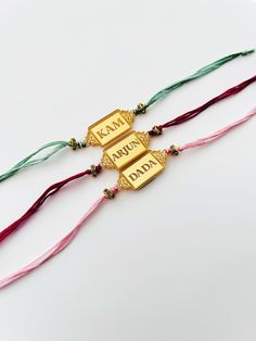 Last day to order the Rakhi for UK customers is 9th August - no later as Im away the following week.   Personalised name Rakhi This is a listing for one personalised Rakhi which can be engraved with a name of your choice.  Please add a clear note of the name you require & also keep in mind the longer the name the smaller it will appear.   The name is engraved on a 4cm (approx) acrylic tag.  All our acrylic products are posted via Royal Mail 1st Class Tracked & Signed service (UK only) Delivery w Name Rakhi, Gold Rakhi, Acrylic Products, Hindu Festival, Hindu Festivals, Braided Bracelets, Last Day, About Uk, Royal Mail