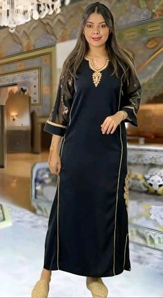 This top quality garndoura, in black silk crepe, zwak lmaalem and Tlija sleeves. Belt not included. This caftan is ideal for family occasions such as family celebrations, the month of Ramadan, Aid, or weddings. Several sizes available. It is also possible to personalize your caftan according to your taste, contact us for more information. Top quality caftan, in silk crepe, with zwak lmaalem. Tea belt is not included. This caftan is ideal for family occasions such as family celebrations, the mont Black Abaya For Eid Party, Black Party Abaya For Eid, Black Long Sleeve Kaftan For Eid, Traditional Black Kaftan For Party, Black Abaya With Dabka For Party, Traditional Black Party Kaftan, Elegant Black Kaftan For Festivals, Party Black Abaya With Dabka Detail, Traditional Black V-neck Abaya