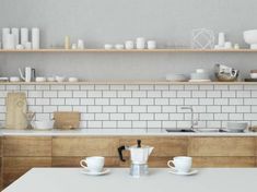 the kitchen counter is clean and ready to be used for breakfast or dinner time,