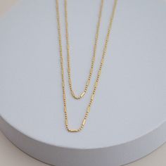 the namesake of our shape of you collection, this necklace embodies the concept behind the collection: taking it back to basics with simple, everyday, elevated pieces. 18kt gold BR gold filled available in 16" or 18" in length 14k Gold Filled Figaro Chain Necklace For Layering, Minimalist 14k Gold Filled Charm Necklace For Layering, 14k Gold Filled Figaro Chain Charm Necklace For Everyday, Everyday 14k Gold Filled Charm Necklaces With Figaro Chain, Everyday 14k Gold Filled Charm Necklace With Figaro Chain, Everyday 14k Gold-filled Charm Necklace With Figaro Chain, Everyday 14k Gold Filled Charm Necklace With Satellite Chain, Everyday 14k Gold Filled Charm Necklaces With Delicate Chain, Delicate 14k Gold-filled Charm Necklace For Everyday