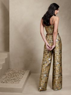 Take leave from the crowd with this eye-catching wide-leg pant in a shimmering, metallic jacquard fabric—truly a pant that will be the talk of the party.  WIDE-LEG FIT: High waisted.  Straight from waist to hip with a pleated front and wide leg.  E Brocade Pants, Trendy Dress Outfits, Jumpsuit Outfit, The Talk, Indian Outfit, Jumpsuit Fashion, Gold Floral, Jacquard Fabric, Trendy Dresses