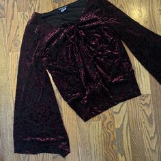 Size Small Venus Brand- Wine Color Velour Blouse W Black Undertones. With Beautiful Bell Sleeves. Never Worn Stretch Burgundy Tops For Night Out, Burgundy Tops For Fall Party, Burgundy Top For Fall Party, Burgundy Blouse For Fall Night Out, Fitted Burgundy Top For Evening, Fall Party Burgundy Blouse, Fall Party Burgundy Top, Burgundy Stretch Top For Night Out, Fitted Burgundy Tops For Night Out