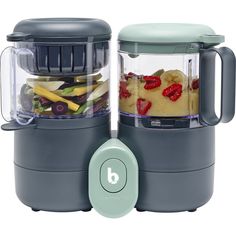 two blenders filled with food on top of each other