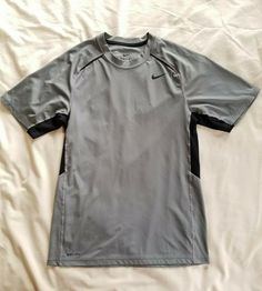 Nike Gray athletic tee Men's Size S @boyds_boutique W Nike Short Sleeve T-shirt For Gym, Nike Gray Sports T-shirt, Nike Sports T-shirt In Gray, Gray Short Sleeve Sports Shirt, Nike Short Sleeve Gym T-shirt, Nike Gray Crew Neck Shirt, Nike Gray Short Sleeve Shirt, Nike Short Sleeve Shirt With Moisture-wicking, Tshirt Design