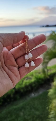 Pikake Flower Earrings 14K Gold Filled White Pikake Flower made if Coral Handmade in Lahaina, Hawaii Mahalo Delicate White Teardrop Flower Earrings, Dainty White Dangle Flower Earrings, White Pearl Drop Cluster Earrings As Gift, White Pearl Drop Cluster Earrings For Gift, White Cluster Earrings With Pearl Drop For Gift, White Flower Cluster Earrings, White Dangle Birth Flower Earrings, White Dangle Earrings With Birth Flower, White Flower-shaped Cluster Earrings For Gifts