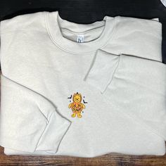 Festive Pumpkin Pooh Embroidered Sweatshirt- Fall/Halloween Halloween Embroidered Cotton Sweatshirt, Embroidered Cotton Sweatshirt For Halloween, Custom Embroidered Long Sleeve Top For Halloween, Halloween Embroidered Long Sleeve Tops, Halloween Embroidered Streetwear Top, Halloween Long Sleeve Sweatshirt With Custom Embroidery, Casual Halloween Sweatshirt With Custom Embroidery, Long Sleeve Custom Embroidered Sweatshirt For Halloween, Long Sleeve Halloween Sweatshirt With Custom Embroidery