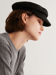 - Newsboy cap design- Adjustable velcro bandMeasurements- Brim: 1.9in- Height: 2.7in- Hat circumference: 21.6in-22.8inComposition - 100% WoolDesigner- Made in Korea- by NUHAT- Style# 300750936 Black Flat Cap For Winter, Winter Classic Baseball Cap With Short Brim, Black Wool Cap For Winter, Classic Winter Hat With Visor, Classic Winter Visor Hat, Black Winter Visor Baseball Cap, Classic Winter Hats For Workwear, Casual Black Brimmed Beret, Casual Brimmed Hat For Work