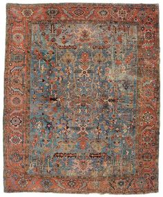 an antique rug with many different colors and patterns