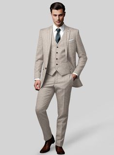 Emulate every experience with graceful precision with the Loro Piana Elettra Wool Silk Linen Suit, a testament to understated prestige. This versatile ensemble features a blend of wool, silk, and linen in a classic beige hue with a solid pattern. The luxurious fabric composition ensures a breathable feel with a subtle sheen, making it ideal for warmer seasons and formal affairs alike. Whether commanding upscale gatherings or attending a summer soirée, this suit exudes timeless style and impeccable taste.   A marriage of elegance and comfort, Loro Piana fabrics are made using the highest quality raw materials in the world, in their purest form or blended together. A sophisticated response to the dictates of contemporary elegance, these fabrics lend themselves to a wide range of styles to me Elegant Tweed Jacket For Business, Elegant Business Tweed Jacket, Tailored Tweed Jacket In Elegant Style, Tailored Elegant Tweed Jacket, Beige Elegant Three-piece Suit For Semi-formal Occasions, Elegant Beige Three-piece Suit For Business, Elegant Beige Three-piece Suit For Semi-formal Occasions, Elegant Beige Three-piece Suit, Timeless Notch Lapel Three-piece Wedding Suit