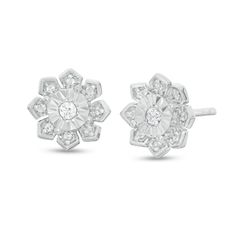 Experience the whimsy of these charming diamond flower stud earrings. Created in sterling silver, each delightful earring showcases a petite diamond - artfully set to enhance size and sparkle. Surrounding the center, pointed petal shapes shimmer with diamonds. Captivating with 1/6 ct. t.w. of diamonds and a bright polished shine, these post earrings secure comfortably with friction backs. Fine Jewelry Diamond White Flower-shaped Diamond Earrings, Fine Jewelry Diamond Earrings In Flower Shape, White Diamond Accented Flower Earrings, White Flower Earrings With Diamond Accents, White Diamond Flower Earrings In Fine Jewelry Style, Fine Jewelry White Diamond Flower Earrings, Flower Shaped Diamond Earrings In Fine Jewelry Style, Fine Jewelry Flower-shaped Diamond Earrings, Fine Jewelry Flower-shaped Earrings With Single Cut Diamonds