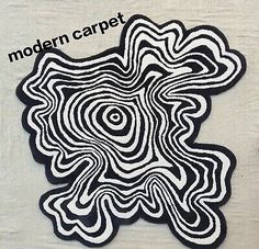 a black and white pattern with the words modern carpet on it