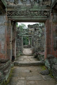 an archway in the middle of a stone building