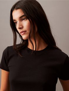 A classic cotton t-shirt, refined in a sleek silhouette. Styled with short sleeves and a crewneck. Made with a soft hand for extra comfort.  Material: 100% Cotton. Soft Hands, Soft Hand, Cotton T Shirt, Cotton Tee, Cotton Tshirt, Calvin Klein, Short Sleeves, Sleek, Crew Neck